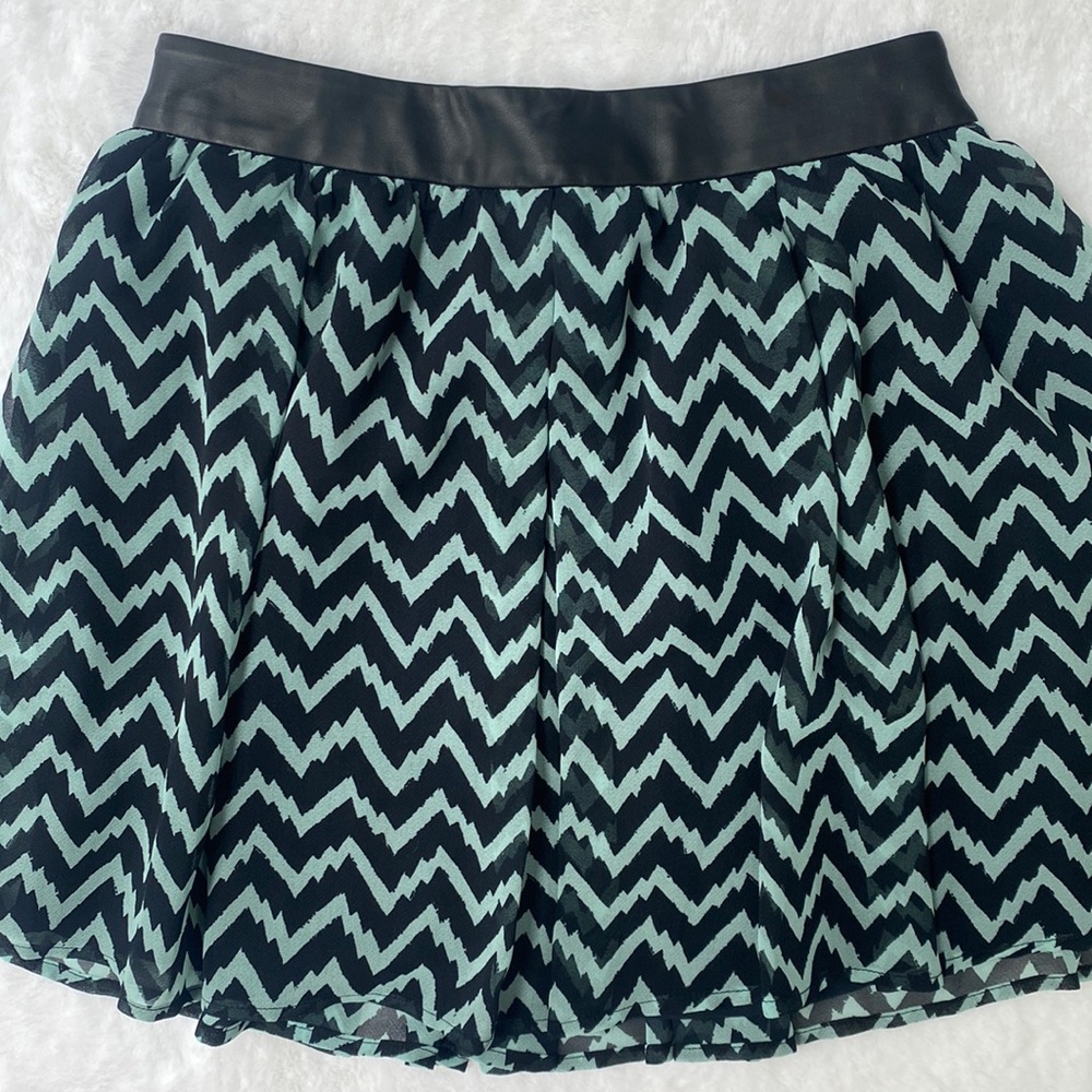 BCBGeneration chevron print mini skirt with leather detail in front